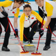 Curling - Pyeongchang 2018 Winter Olympics - Women's Round Robin - Sweden v China - Gangneung Curling Center - Gangneung, South Korea - February 21, 2018 - Wang Bingyu of China watches as team mates sweep. REUTERS/Phil Noble
